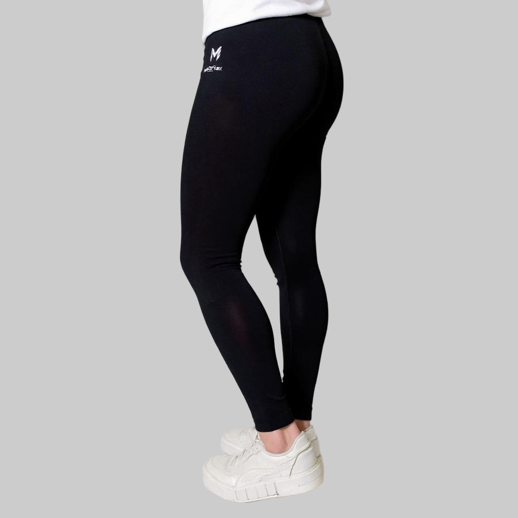 Person wearing black leggings with a logo on a white background
